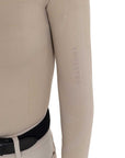 Sleeve detail of the Equestro training shirt with tonal EQUESTRO wordmark along the forearm