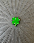 Close up view of Pinsnickety Clover horse show number pin.