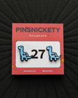 Pinsnickety brontosaurus horse show number pins on their product packaging card.