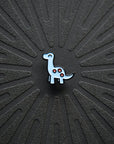 close up view of Pinsnickety's Brontosaurus horse show number pin