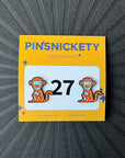 pinsnickety monkey horse show number pins on a black background