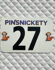 pinsnickety monkey horse show number pins on a saddle pad