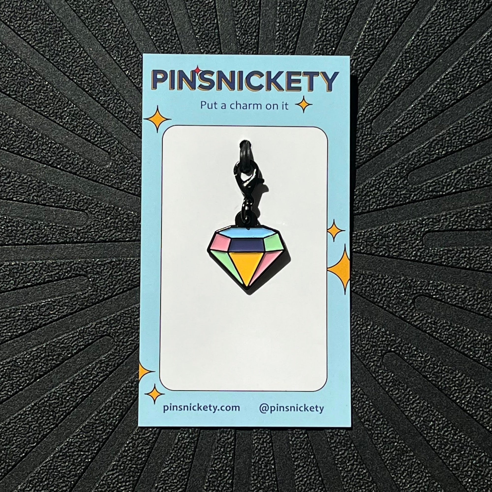 pinsnickety gem braid and bridle charm on a black background