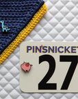 Pinsnickety Brontosaurus pin paired with our Flying Pig pin.