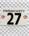 Pinsnickety Flying Pig horse show number pins on a saddle pad