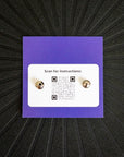 pinsnickety horseshoe horse show number pins on their product packaging card from the back showing instructions qr code and locking clasps