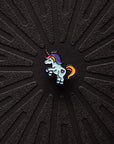 Close up view of Pinsnickety Flying Unicorn horse show number pin.