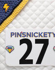 pinsnickety lightning bolt electric yellow horse show number pin on a bonnet and gem horse show number pins on a saddle pad