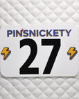 pinsnickety lightning bolt horse show number pins in special edition electric yellow on a saddle pad