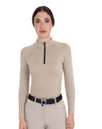 Equestro Women's Technical Knit Long Sleeve Training Shirt in Cobblestone, front view on model with black quarter-zip mock neck