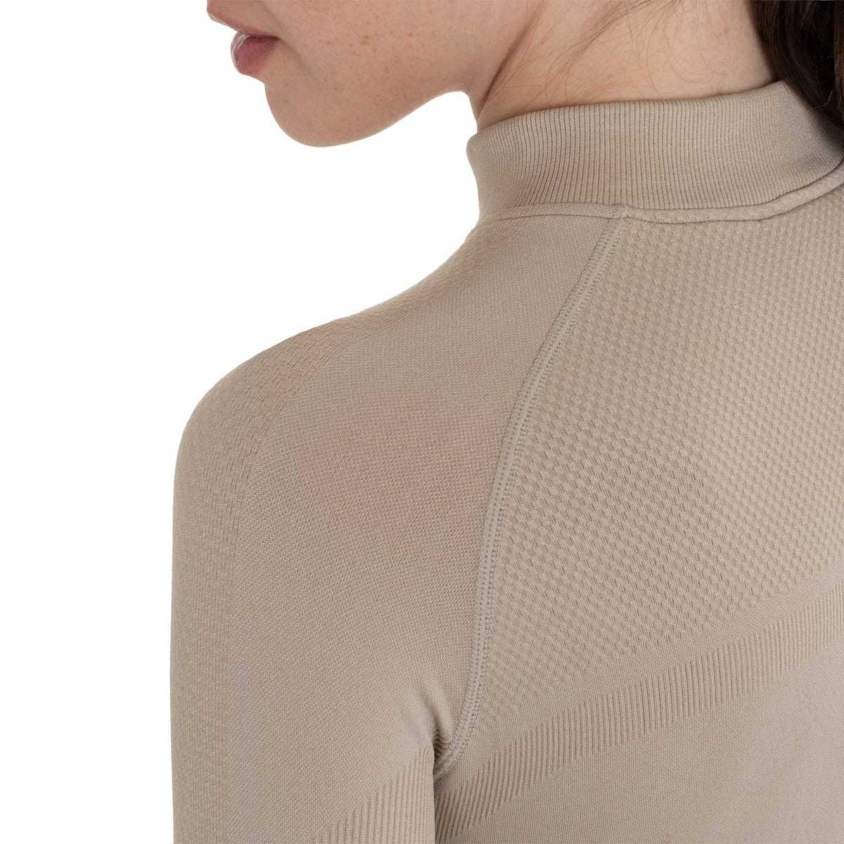 Shoulder detail of the Equestro training shirt showing seamless raglan construction and ventilated knit panel
