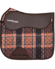 Saddle pad with plaid pattern and brown accents on a white background