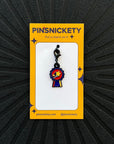 pinsnickety champion braid bridle bonnet charm on a black background