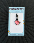pinsnickety flying pig braid bridle and bonnet charm on a black background