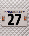 Pinsnickety Fox horse show number pins on a saddle pad