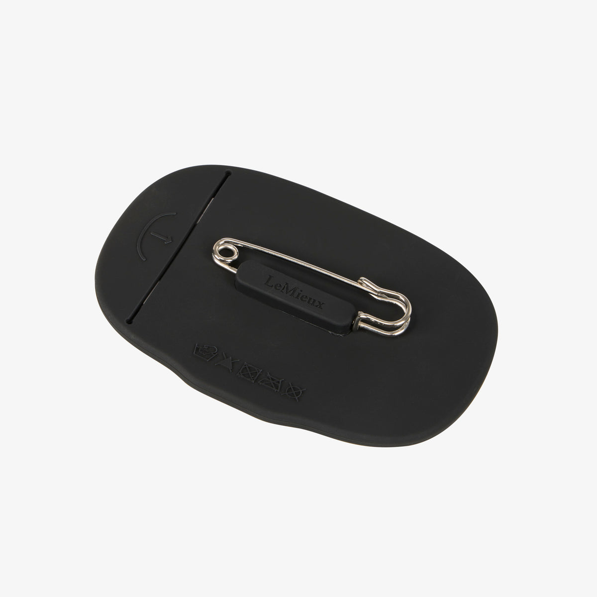 LeMieux silicone saddle pad number holder in black, back view showing the stainless steel safety pin