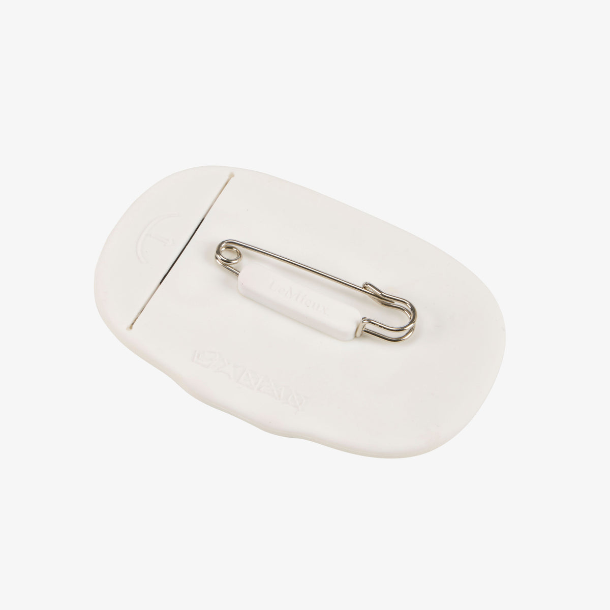 LeMieux silicone saddle pad number holder in white, back view showing the stainless steel safety pin