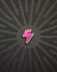 Close up view of Pinsnickety's Lightning Bolt horse show number pin